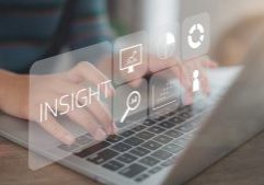 Women use a laptop with insight icons on a virtual screen. Using customer insight to build strong customer relationships and increase customer loyalty. Customer insight marketing concept.